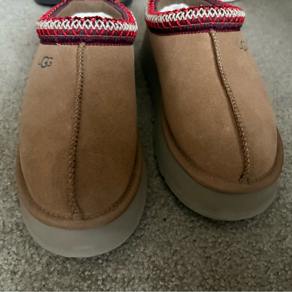 UGG Brown Slip-On Shoes with Red Accents